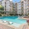 Resort-style pool with sundeck & pergolas at Avana Uptown apartments in Atlanta, GA